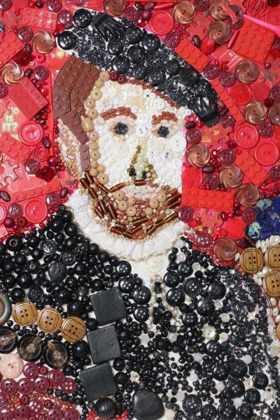 Student artwork of a collage of a man in buttons