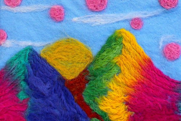 Student artwork of a felt mountainscape