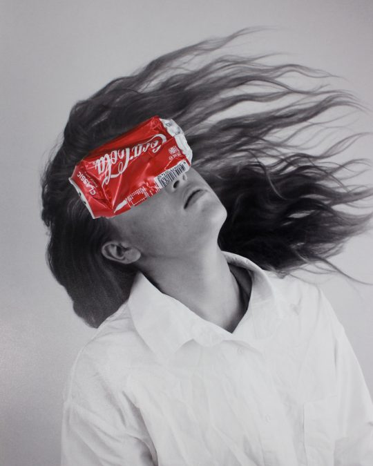 Student artwork of a portrait with a Coke can