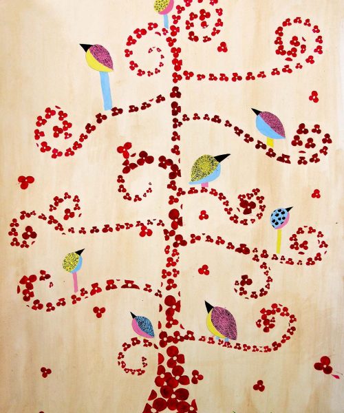 Student artwork of a tree made of flowers with birds