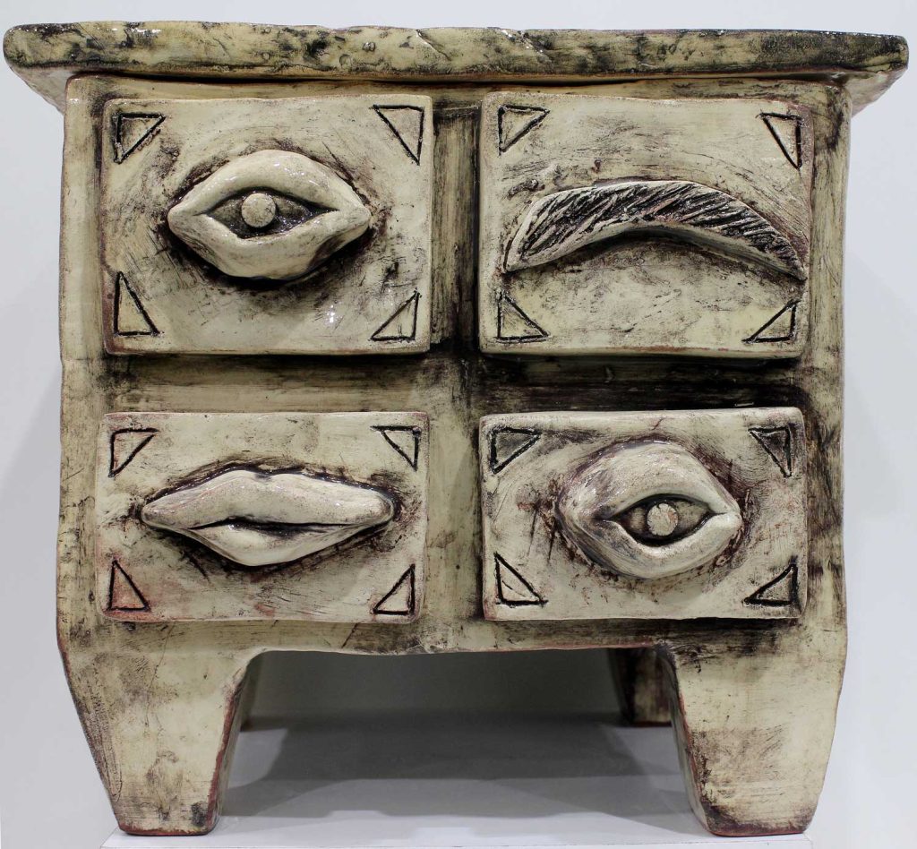 Student ceramic artwork of an armoire