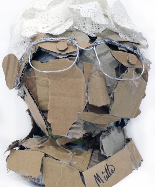 Student artwork of a cardboard portrait bust