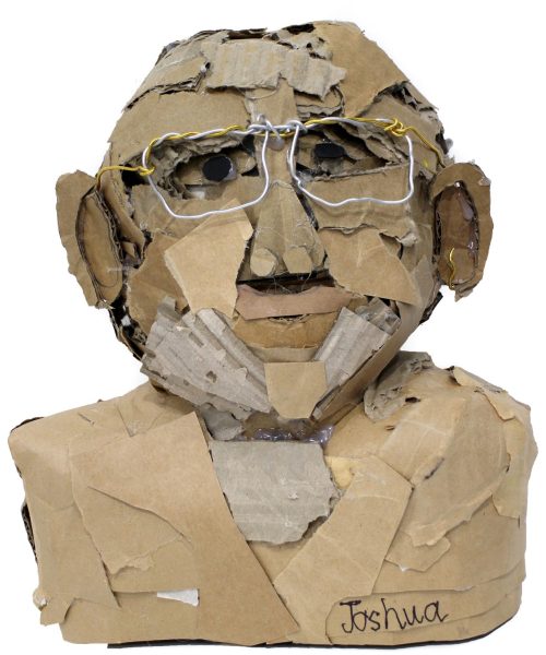 Student artwork of a cardboard portrait bust