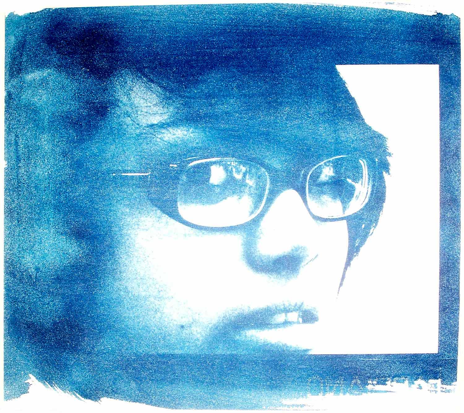 Student artwork of a portrait of a girl in blue