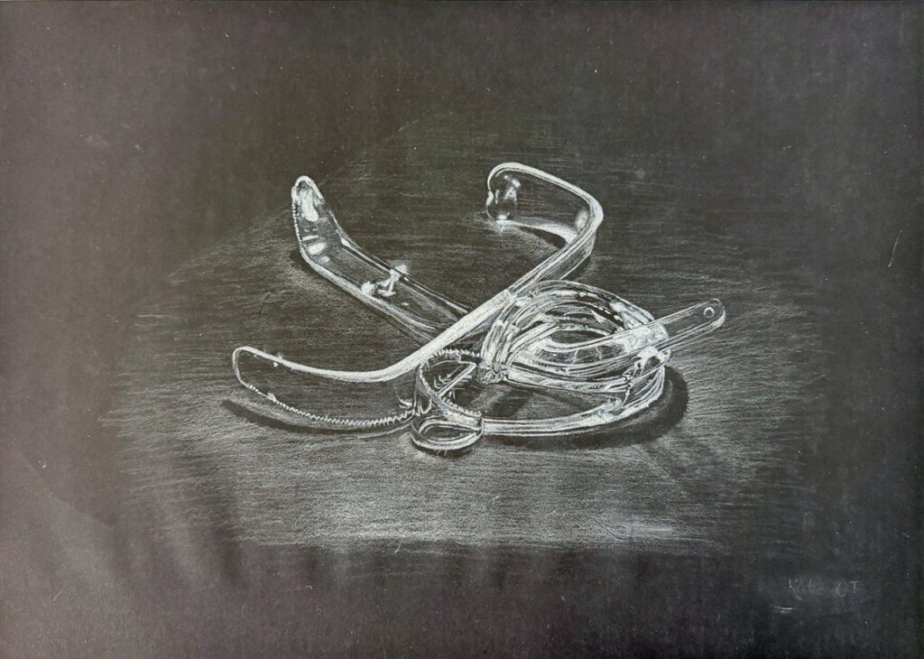 Student artwork of a tonal drawing of twisted cutlery