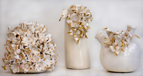 Glazed porcelain with gold lustre by Sophie Blackney, Year 12 Student artwork of porcelain flowers