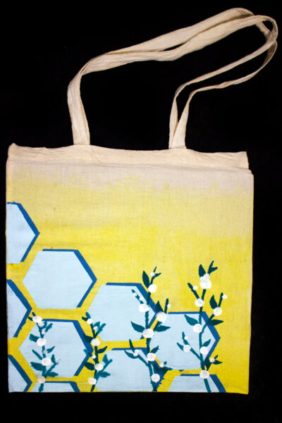 Fabric dye and stencil screen print on fabric by Elaine Shi, Year 8 Student artwork of a handmade tote bag