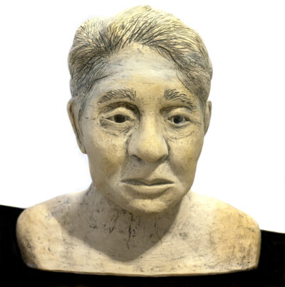 Clay and underglaze by Alannah Perri, Year 11 Student artwork of a clay bust of a woman