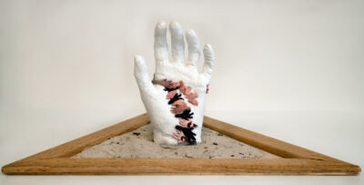 Polymer clay on plaster by Ally Wu, Year 12 Student artwork of a clay hand