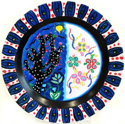 Student artwork of a plate with plants