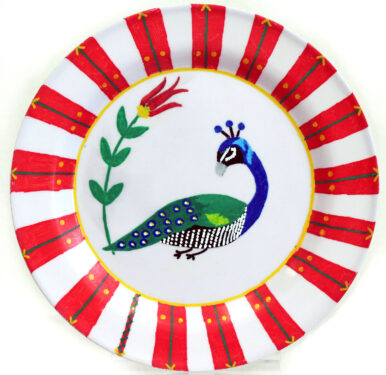 Student artwork of a plate with a peacock