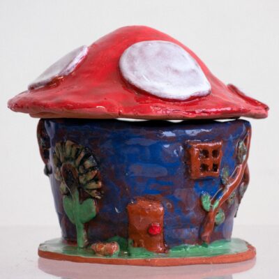 Student artwork of a ceramic house