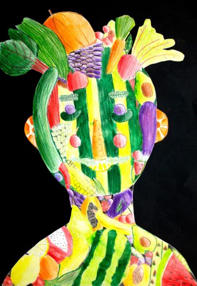 Student artwork of a portrait made of fruit