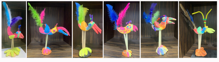 Student artwork of clay feathered birds
