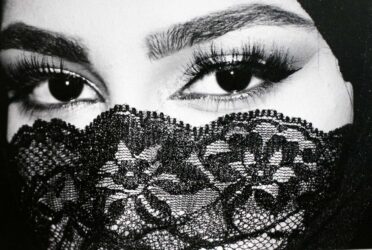 Photographic Print on Canvas by Tanae White, Year 12, Lakeside College Student photograph of a girl wearing a mask