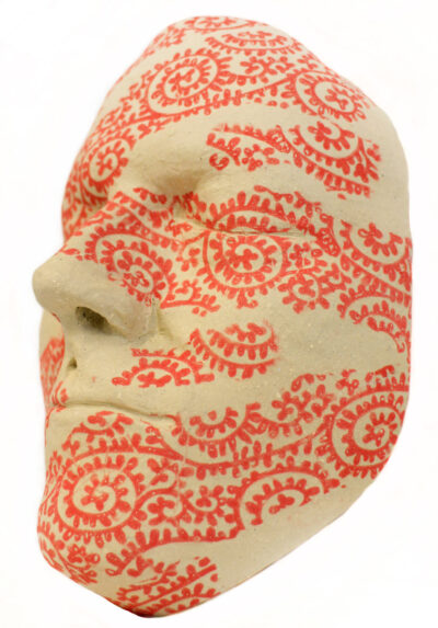 Print on Clay by Niam Sutherland, Year 10, The Hamilton and Alexandra College Student artwork of of a clay mask