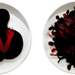 Student artwork of paper cutouts of people