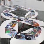 Digital print collage on tables, a group work created by artworks images from the ISV Student Art Collection, shared at the Arts Learning Festival 2019 Student art of the third paradise symbol