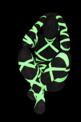 Digital photography by Milla Teodosijevic, Year 11 Student artwork of a glow in the dark person in distress