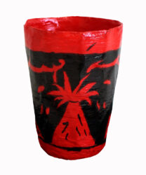 Student artwork of a paper mache cup with volcano