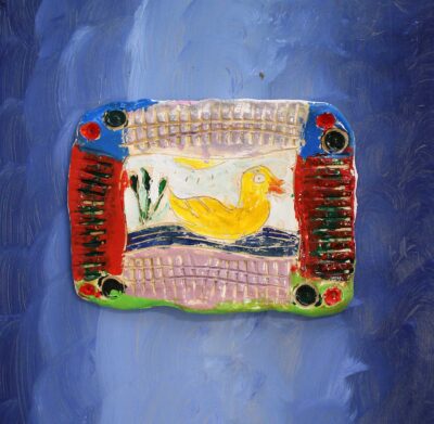 Clay and mixed media by Vanessa Darmos, Year 4, Carey Baptist Grammar School Student artwork of a tile with duck