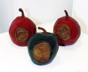Student artwork of ceramic apples