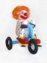 Mixed media by Kara Henderson Year 9, Caulfield Grammar School Student artwork of a clown riding a bike