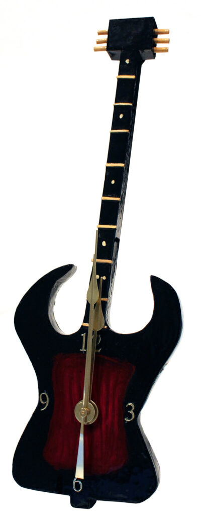 Wood and enamel paint by Kyle Heron, Year 8, Ivanhoe Grammar School Student artwork of a guitar clock