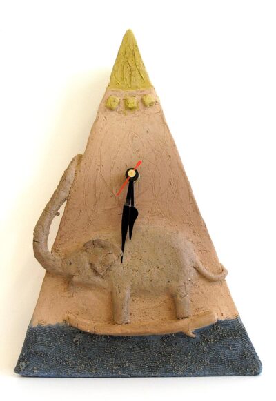 Raku clay and stain by Nicola Leahy, Year 9, Mentone Grammar Student artwork of a clock