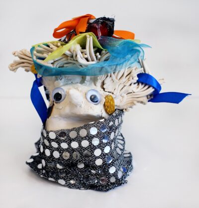 Ceramic and mixed media by HannahShamoon, Year 1, Woodleigh School Student artwork of a ceramic figure with headpiece