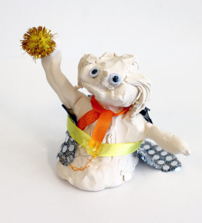 Ceramic and mixed media by MackenzieClark, Year 1, Woodleigh School Student artwork of a ceramic figure with pompom