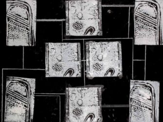 Print on board by Ella Taylor and Matilda Harrop, Year 7, Balcombe Grammar School Student artwork of black and white shapes