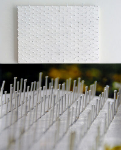 Digital print and mixed media by Allanah Hocking, Year 12, Geelong Grammar School Student artwork of pins sticking out of a white canvas