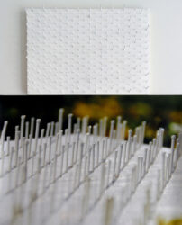 Digital print and mixed media by Allanah Hocking, Year 12, Geelong Grammar School Student artwork of pins sticking out of a white canvas