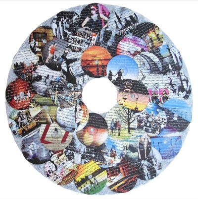 Mixed media by Nurashikin Salem, Year 11, Al-Taqwa College Student artwork of a collage of CDs