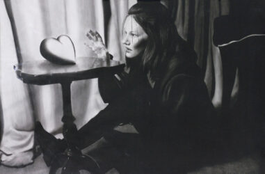 Digital image on paper by Madeline Saunders, Year 12 Student artwork of a seated girl reaching for a heart