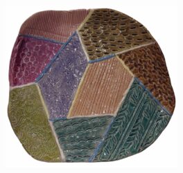 Textured glazed ceramic by Emily Yan, Year 9, Huntingtower Student artwork of a ceramic platter