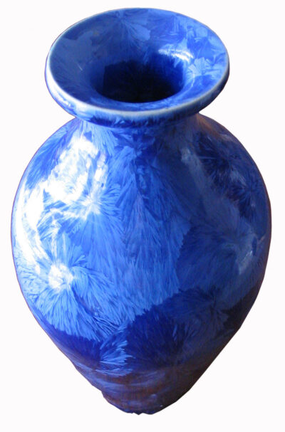 Student artwork of a blue crystalline vase