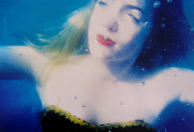 Student artwork of a girl under water