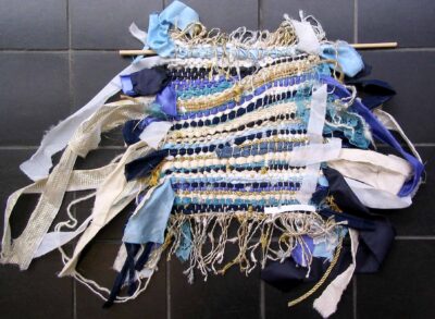 Wool fibre and ribbons weaving by Hayley White, Year 10, Fintona Girls’ School Student artwork of a weaving