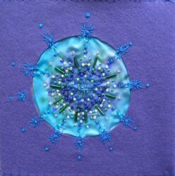 Felt and embroidery by Grace Hibbs, Year 8, Melbourne Rudolf Steiner School Student artwork of a beaded circle pattern