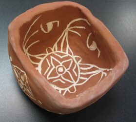 Unglazed terracotta by Alice Jefimenko, Year 8, Melbourne Rudolf Steiner School Student artwork of a terracotta pot