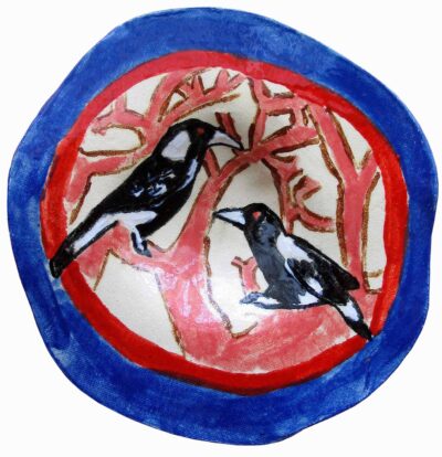 Student artwork of a plate with magpies