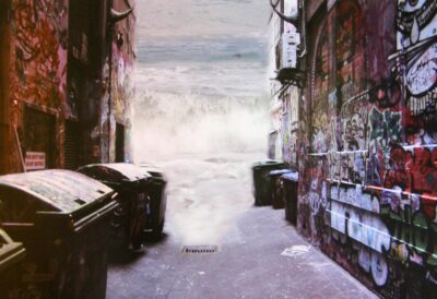 Student digital image of a laneway with bins, graffiti and a wave