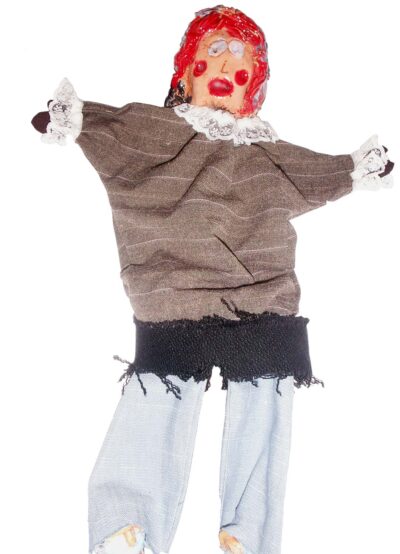 Ceramic and fabric by Matilda Van Buuren Milne, Grade 4, Melbourne Montessori School Student artwork of a puppet wearing a lace collar top