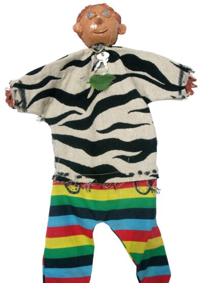 Ceramic and fabric by James Hunter, Grade 4, Melbourne Montessori School Student artwork of a puppet wearing a zebra print top