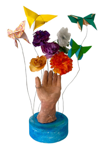 Earthenware clay, polystyrene, tissue paper by Gabriel Lim, Year 10, St Andrew’s Christian College Student sculpture of a hand reaching upwards surrounded by flowers and butterflies