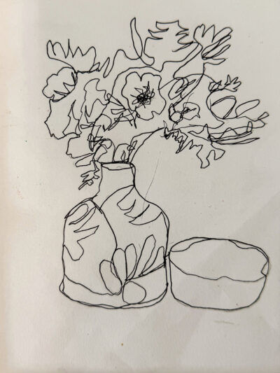 Student artwork of a vase with flowers