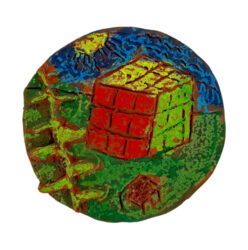 Terracotta clay, pastel and watercolour by Charlie McGregor, Year 3, Melbourne Montessori College Student artwork of a ceramic rubik's cube