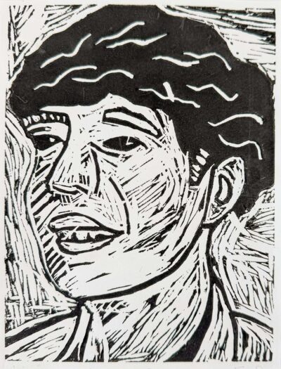 Student artwork of a lino print portrait